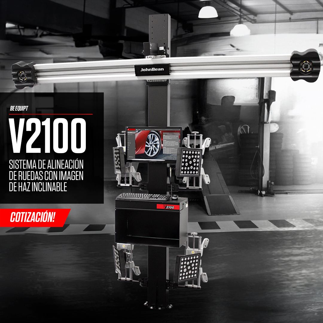 V2100 in an empty garage. "Be equipt v2100 sistema de alineacion de ruedes con imagen haz inclinable. Cotizacion!"