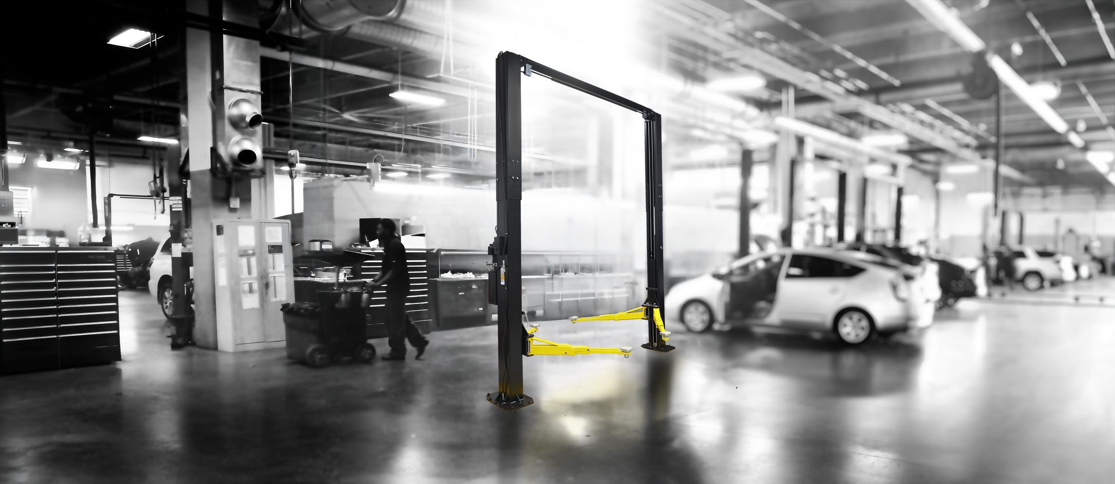 12k 2-post lift in a workshop environment